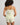 Model wears Smoothie Cami & Short Set in TRANSPARENT YELLOW. On body back view