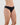 Model wears Cotton And Lace Bikini in BLACK. On body side view