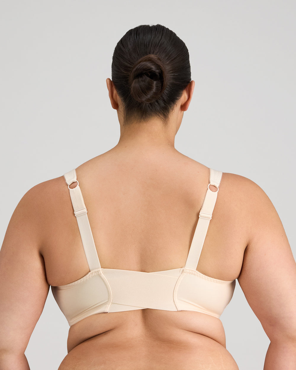 Model wears Ultimate Comfort Front Closure Wire Free Front Opening Bra in PINK CHAMPAGNE. On body back view