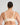 Model wears Ultimate Comfort Front Closure Wire Free Front Opening Bra in PINK CHAMPAGNE. On body back view