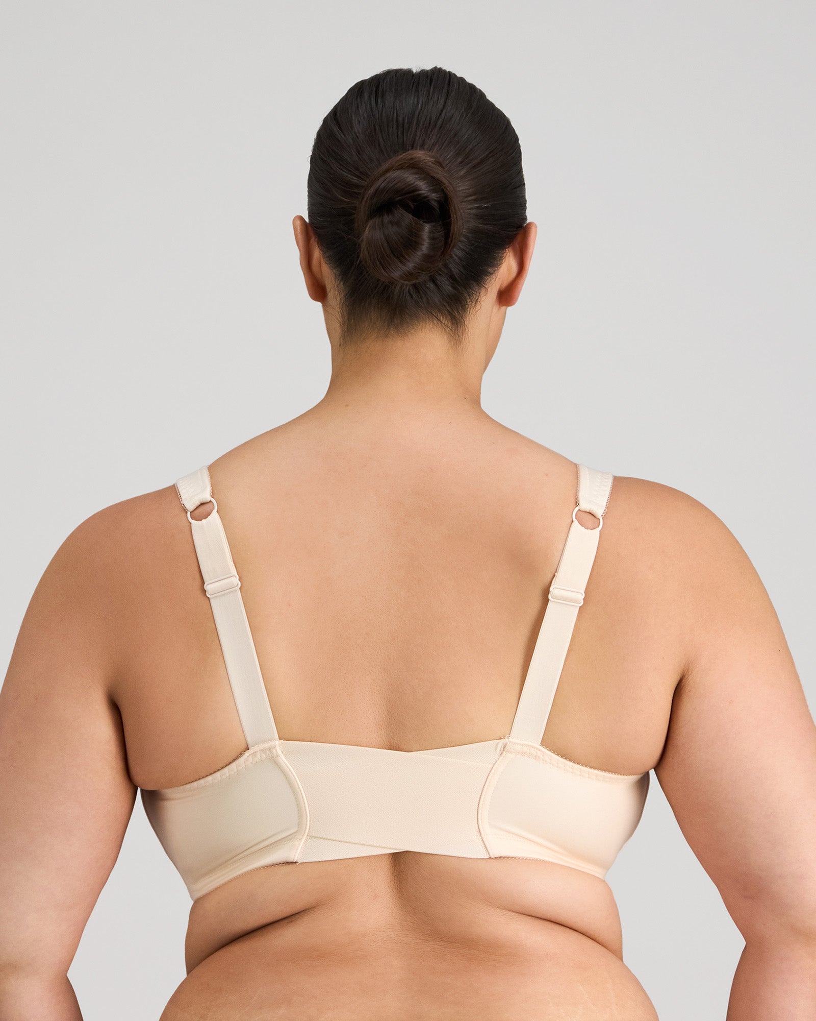 Model wears Ultimate Comfort Front Closure Wire Free Front Opening Bra in PINK CHAMPAGNE. On body back view