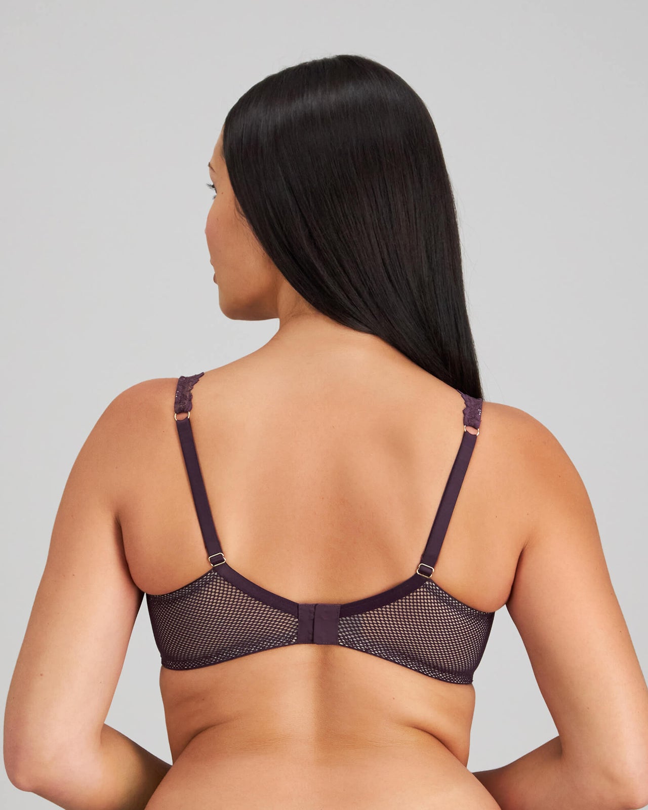Model wears Nova Rosa Underwire Bra in PLUM PERFECT. On body back view