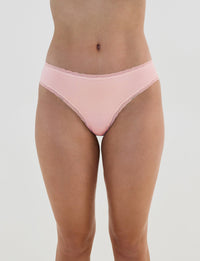 Model wears Stretch Cotton Bikini in ICY PINK. On body front view