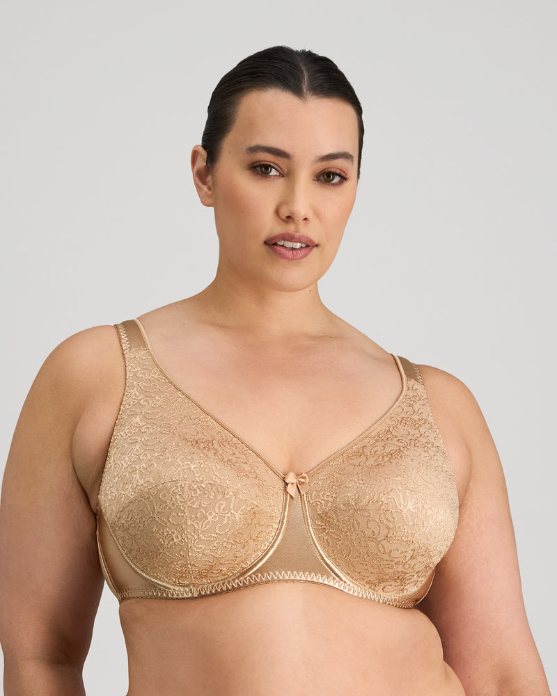 Model wears Charlotte Underwire Bra in TOFFEE. On body front view