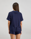 Model wears Belle Bamboo Short Pj Set in NAVY BLAZER. On body back view