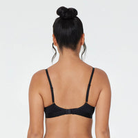 Model wears Body Cotton Contour Bra in BLACK. On body back view