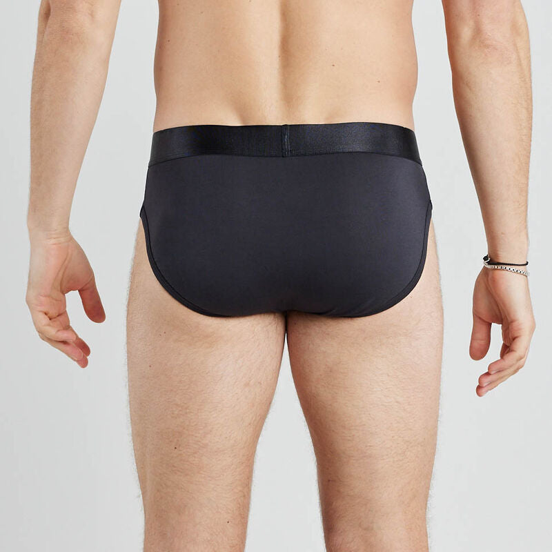 Model wears Bamboo Mens Brief in BLACK. On body back view
