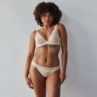 Model wears Morning Lola Underwire Bra in SCALLOP SHELL. On body front view