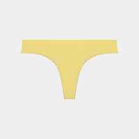 Seamless Thong in SUNSHINE YELLOW. Flat lay front view
