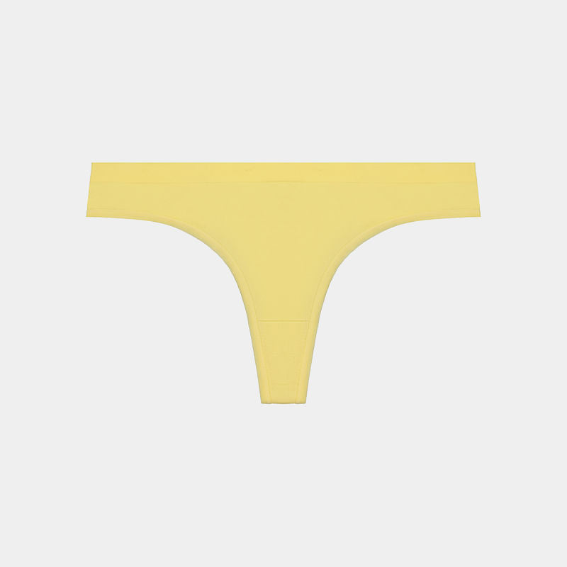 Seamless Thong in SUNSHINE YELLOW. Flat lay front view