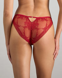 Model wears Niara Bikini in JESTER RED. On body back view