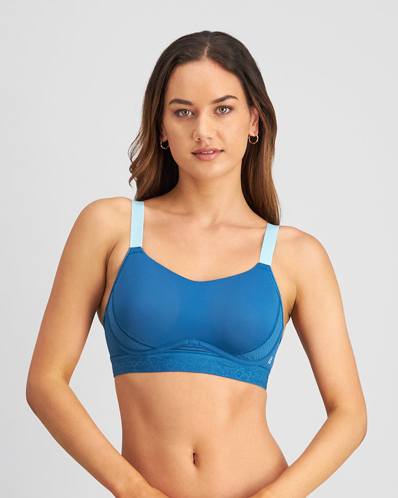 Model wears Bendon Breathe Contour Bra in INK BLUE. On body front view