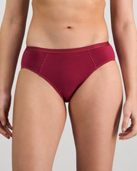 Model wears Body Cotton Bikini in BEAUJOLAIS. On body front view