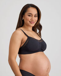 Model wears Bendon Nurture Maternity Bra in BLACK. On body front view