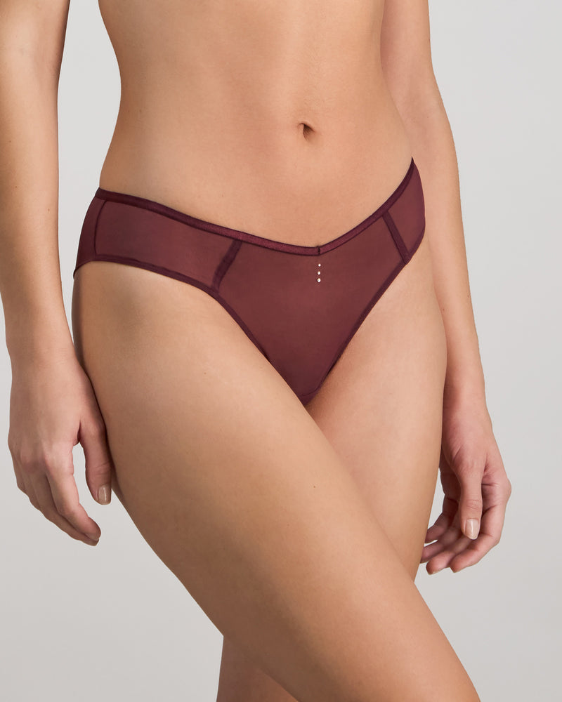 Model wears Sheer Impact Brazilian in FIG. On body side view
