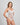 Model wears My Fit Lace Bodysuit in WHITE. On body side view