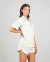 Model wears Holly Short PJ in IVORY. On body side view