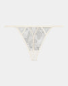 Olivia Luxe Thong in CHAMPAGNE. Flat lay front view
