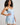 Model wears Sweet Indulgence Chemise in SKYWAY/WHITE. On body side view