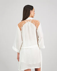 Model wears Eros Robe in SUGAR. On body back view