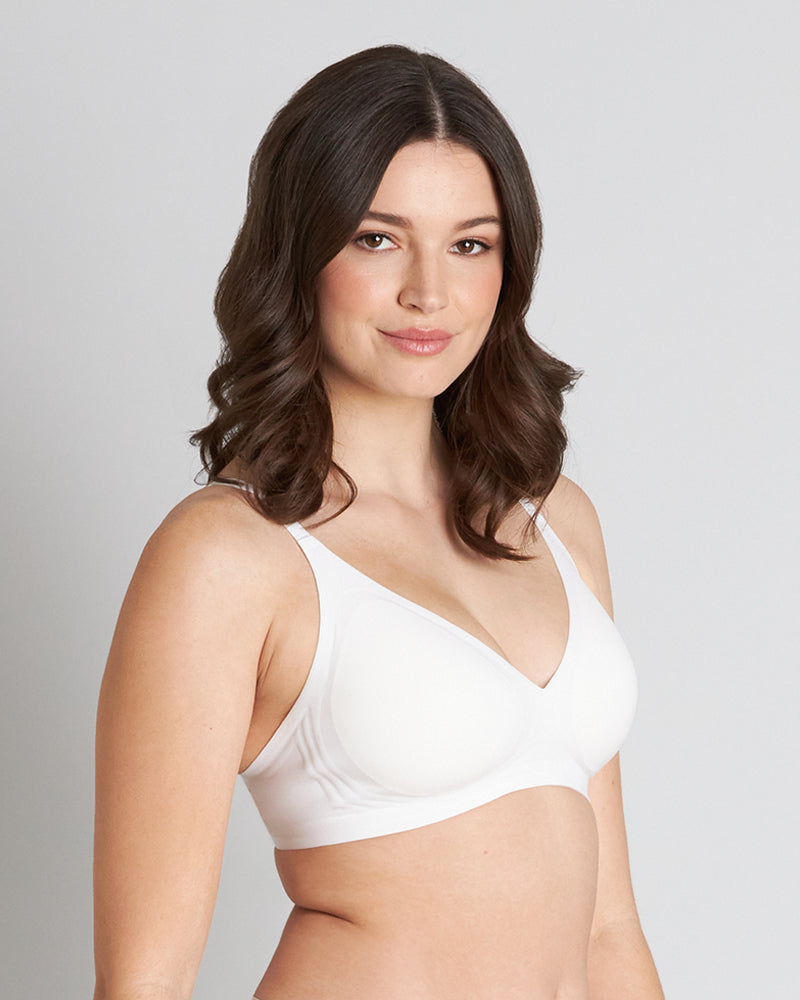 Model wears Comfit Collection Wire Free Bra in WHITE. On body side view
