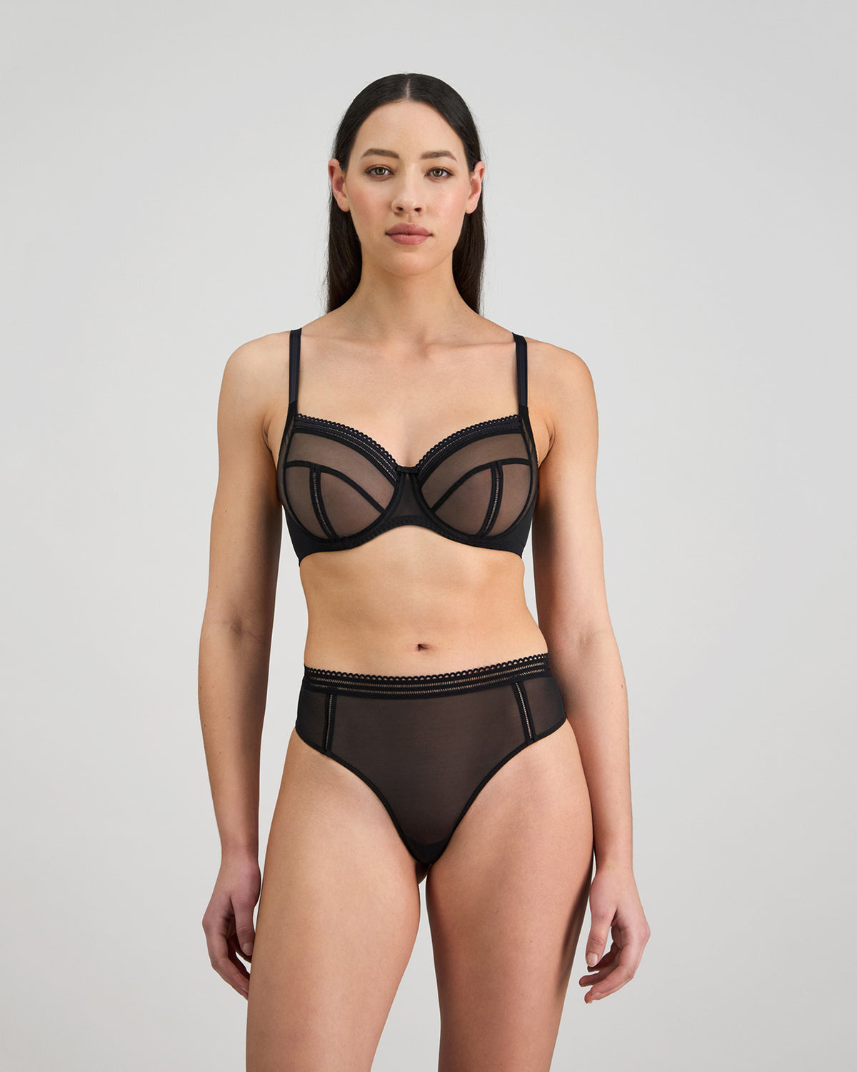 Sheer Essence Underwire Bra in BLACK. Flat lay back view