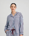Model wears Cabana Stripe Long Sleeve Pj Top in COOL BLUE. On body front view