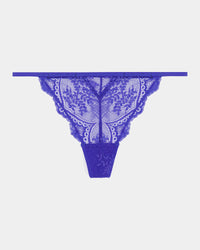 Midnight Muse Thong in DAZZLING BLUE. Flat lay front view