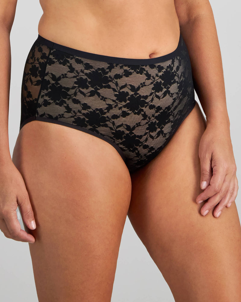 Model wears Lace Sculpt Full Brief in BLACK. On body side view