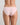 Model wears Seamless Soft Bikini in ICY PINK. On body back view