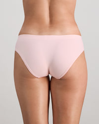 Model wears Seamless Soft Bikini in ICY PINK. On body back view