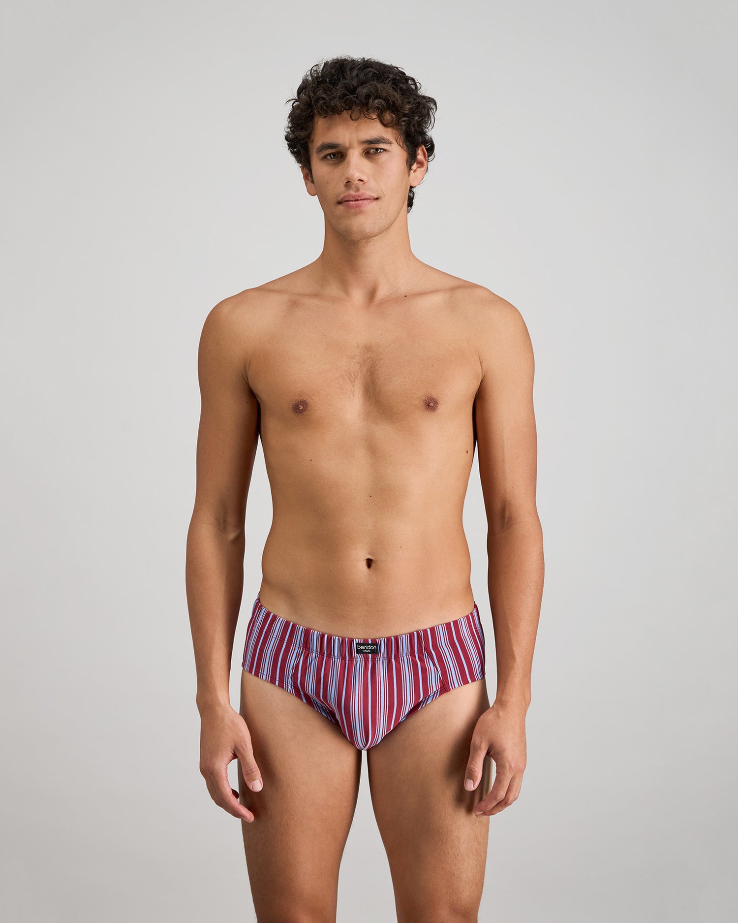 Cotton Stretch Mens Brief in TIBETAN RED STRIPE. Feature shot
