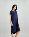 Model wears Belle Bamboo Nightie in EVENING BLUE. On body side view