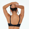 Model wears Active Underwire Bra in BLACK. On body back view
