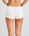 Model wears Simply Seamless Boyshort in WHITE. On body back view