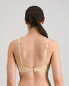 Model wears Simply Seamless Contour Bra in Nude. On body back view