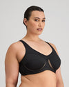 Model wears Bendon Sports Underwire Bra in BLACK. On body side view