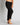 Model wears Mihika Sleeping Jogger in BLACK. On body side view