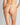 Model wears Olivia Luxe Thong in CHAMPAGNE. On body back view