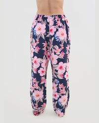 Model wears Mihika Sleeping Long PJ Pant in HONOLULU HAZE PRINT. On body back view