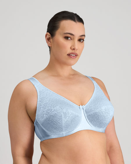 Model wears Charlotte Underwire Bra in SKYWAY. On body side view