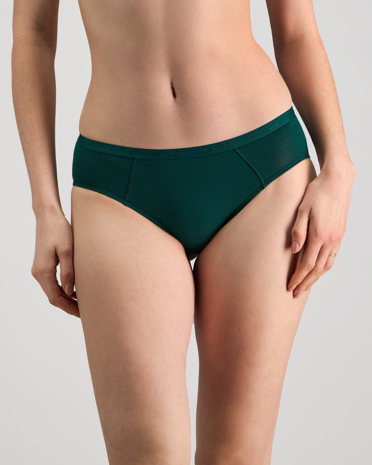 Model wears Body Cotton Bikini in RAIN FOREST. On body front view