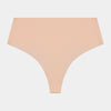 No Show Thong in LATTE. Flat lay front view