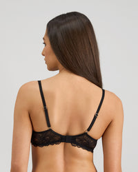 Model wears Lace Impact Underwire Bra in BLACK. On body back view