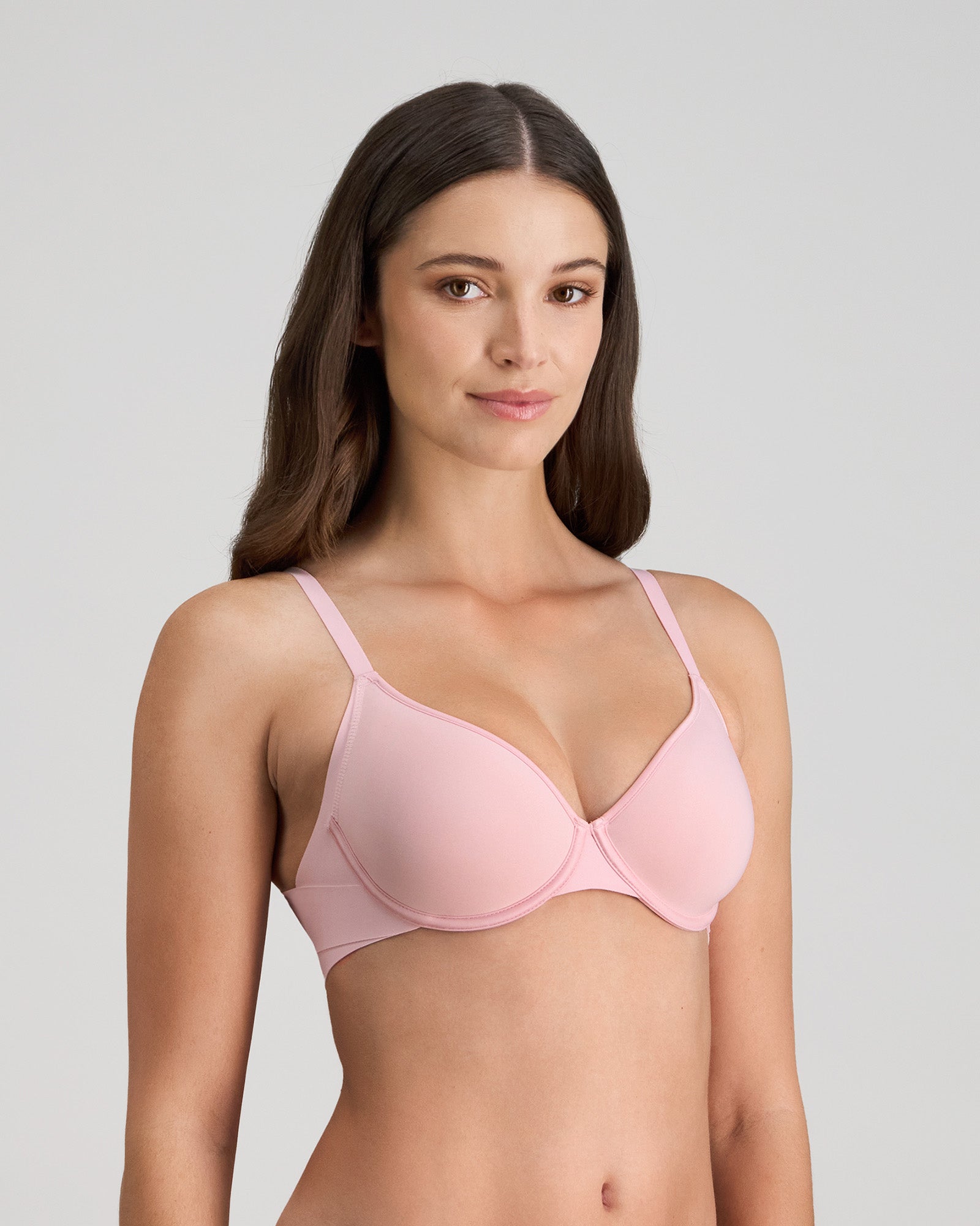 Model wears Flawless Form Contour Bra in ICY PINK. On body side view