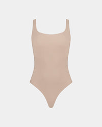 Extra-Ordinary Bodysuit in LATTE. Flat lay front view