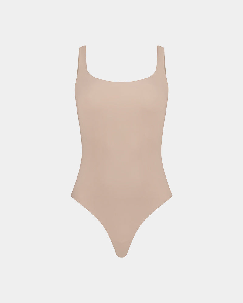 Extra-Ordinary Bodysuit in LATTE. Flat lay front view