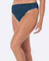 Model wears Coral High Cut Brief in REFLECTING POND. On body side view