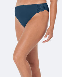 Model wears Coral High Cut Brief in REFLECTING POND. On body side view