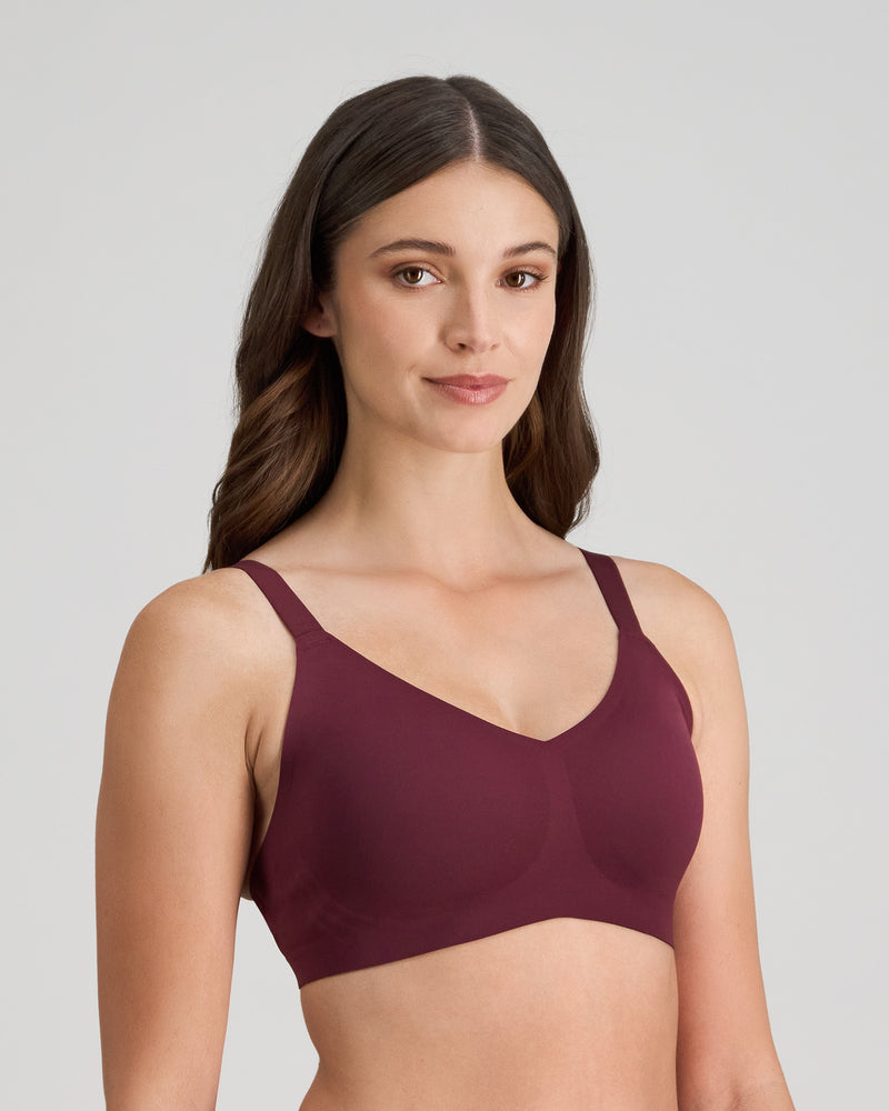 Model wears Comfit Collection Wire Free Bra in FIG. On body side view